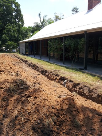 root barrier trench at front of house