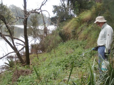 Ian spraying billygoat and molasses